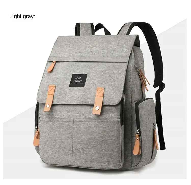 sac à dos à langer gris pale