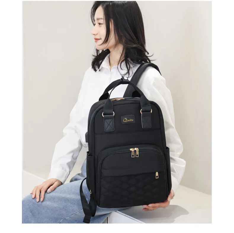 sac à dos à langer noir stylée