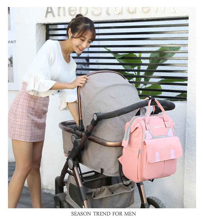 sac à dos à langer sangle pour poussette