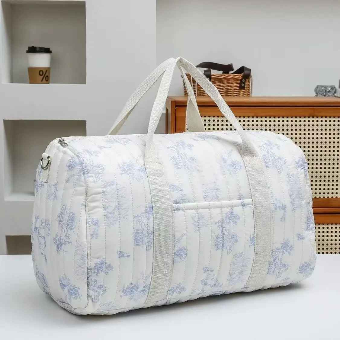 sac Ă  langer fleuri bleu spacieux