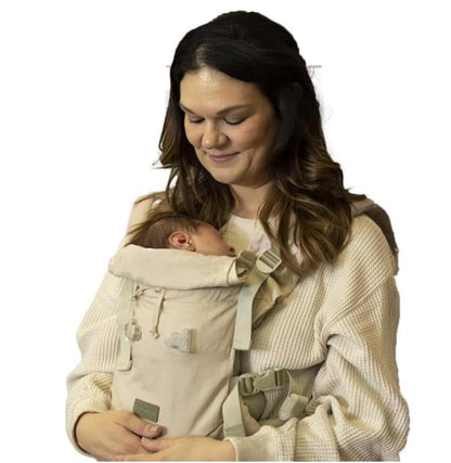 porte bébé de couleur beige ergonomique allie le confort