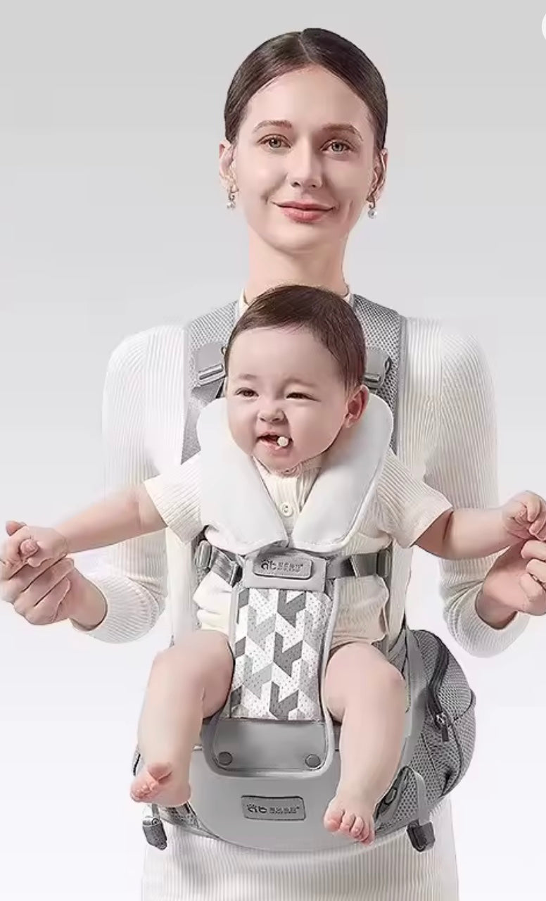 porte bébé physiologique de couleur gris