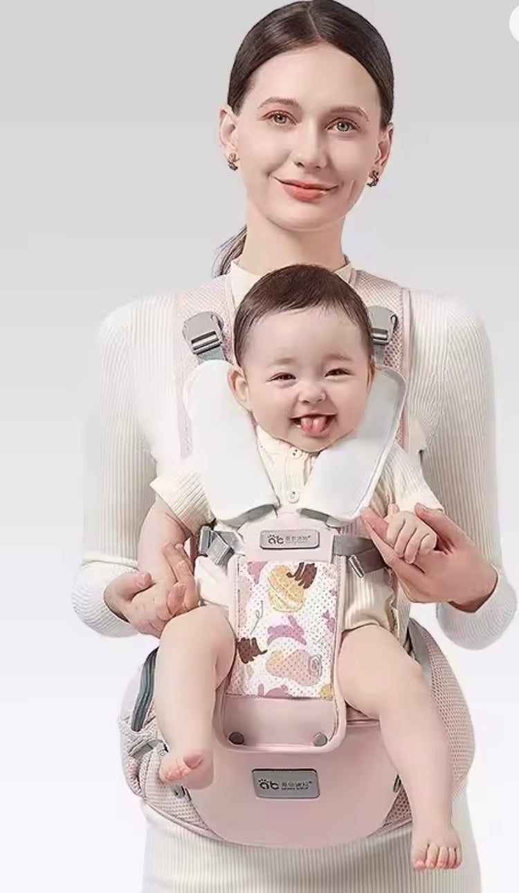 porte bébé physiologique de couleur rose