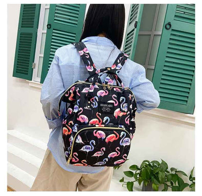 sac à dos à langer flamant rose