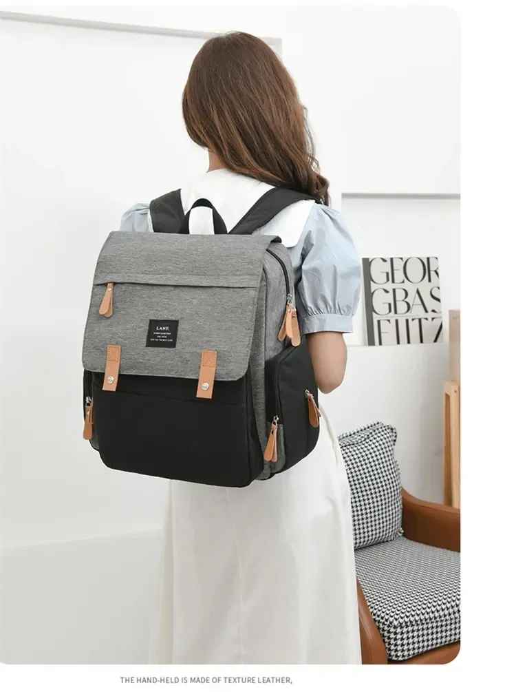 sac à dos à langer noir gris