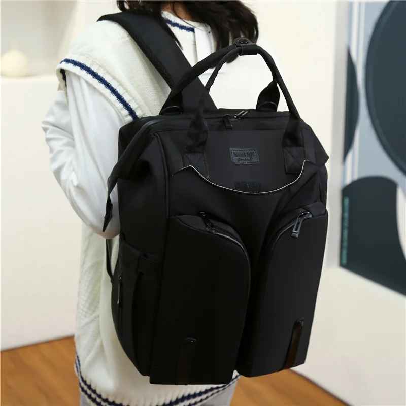 sac à dos à langer noir stylée