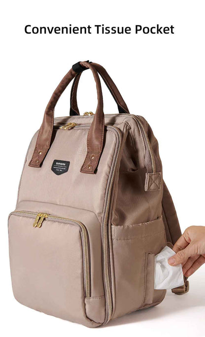 sac à dos à langer poche moucheoir