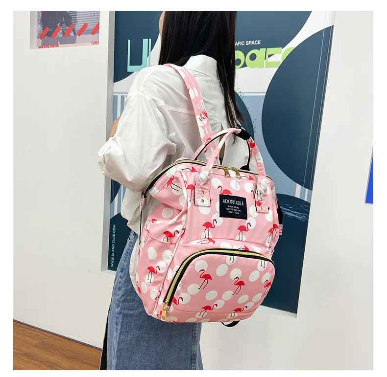 sac à dos à langer rose flamant rose
