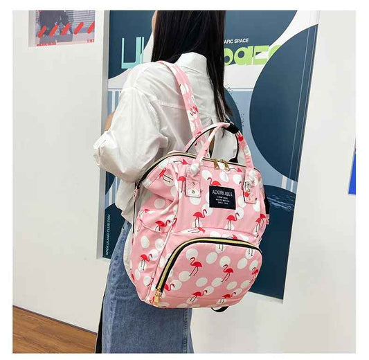 sac à dos à langer rose flamant rose
