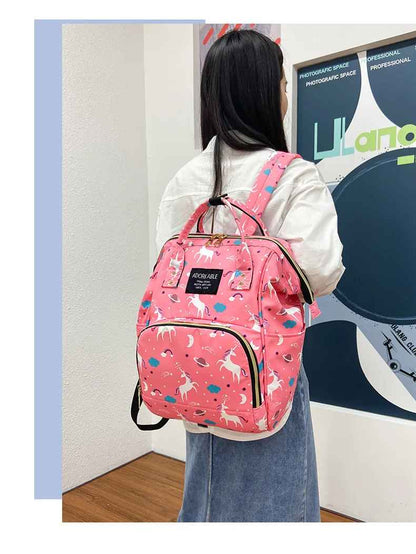 sac à dos à langer rose licorne